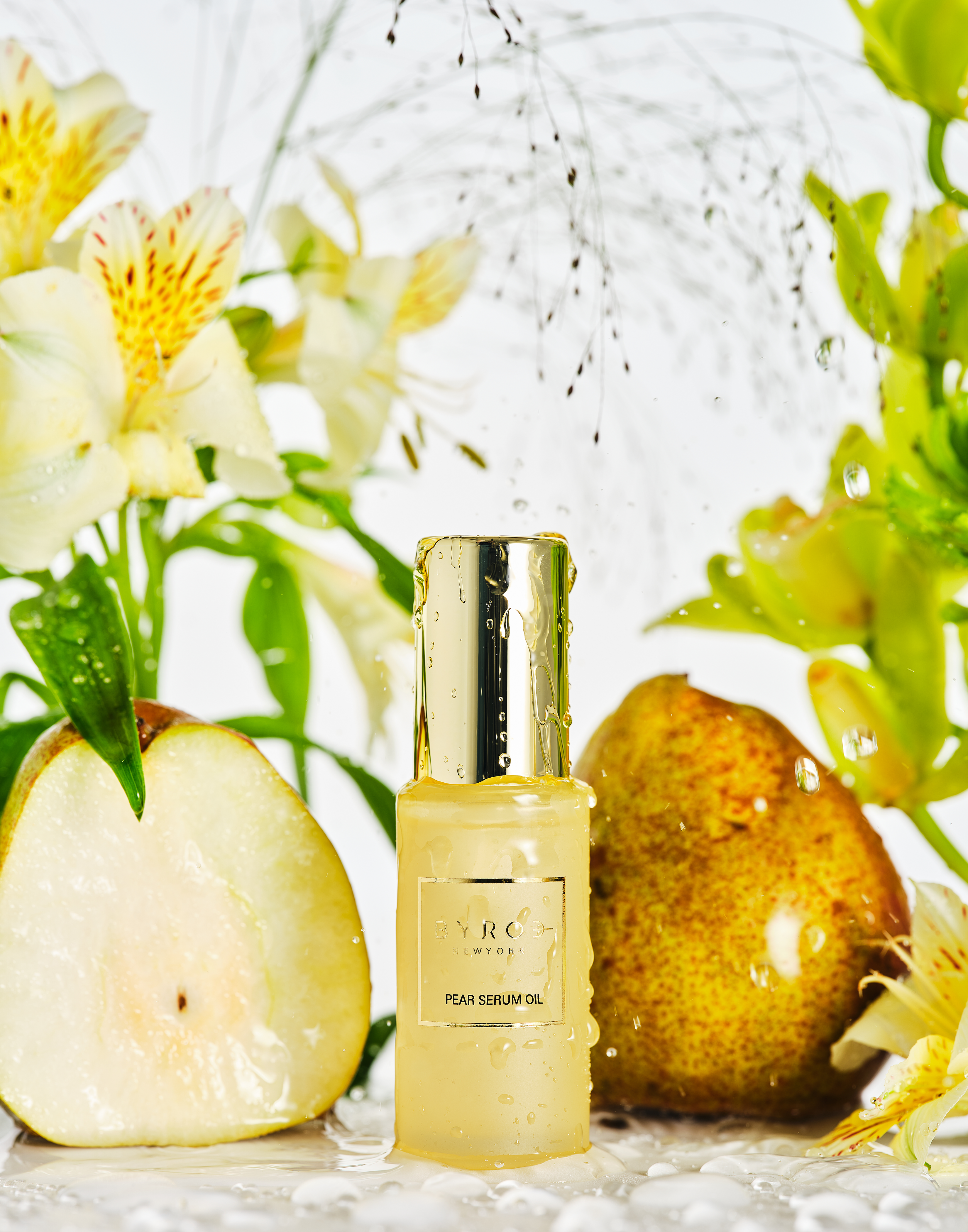 Photo of Pear Serum Oil surrounded by pears