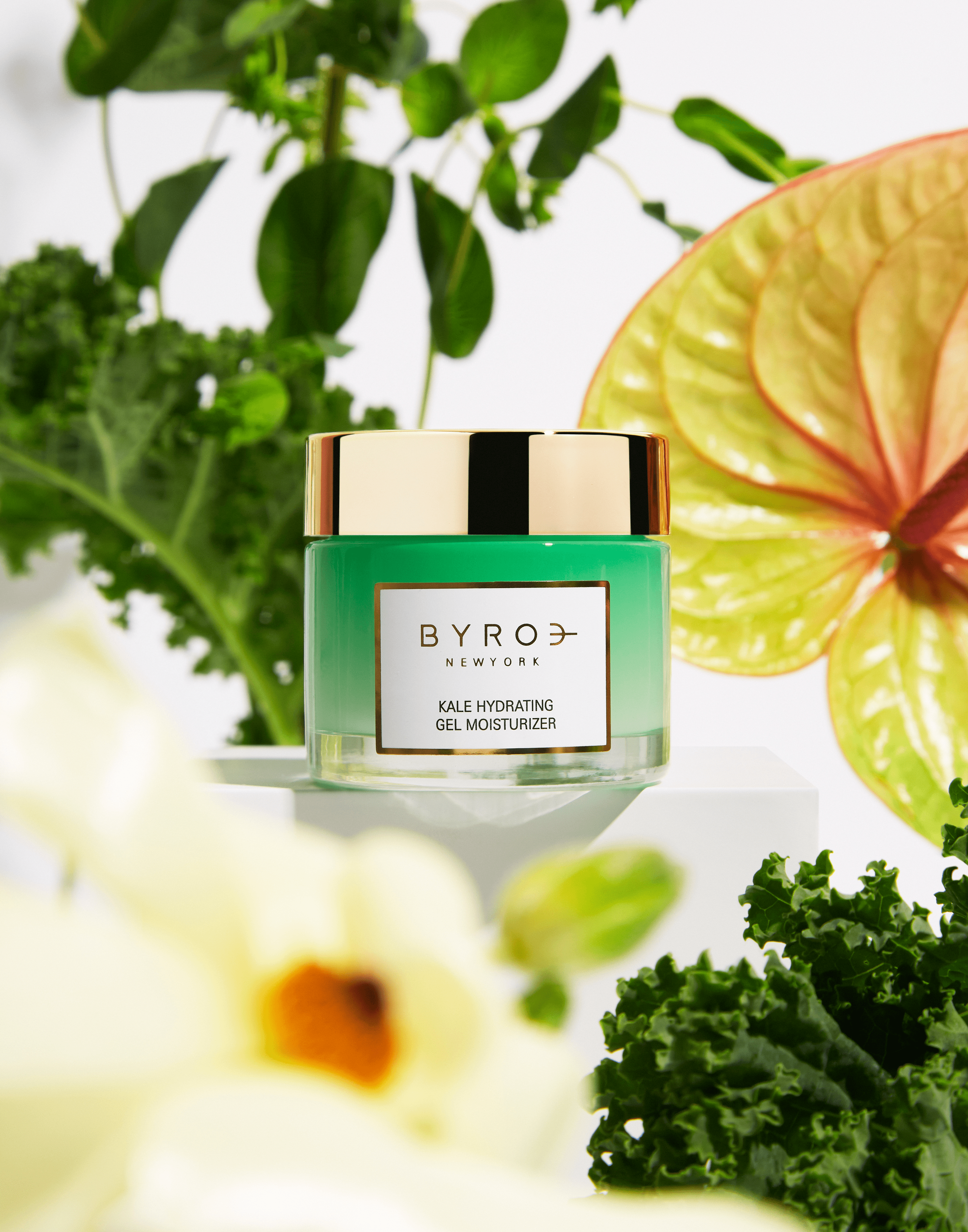 Photo of Kale Hydrating Gel Moisturizer surrounded by florals and kale