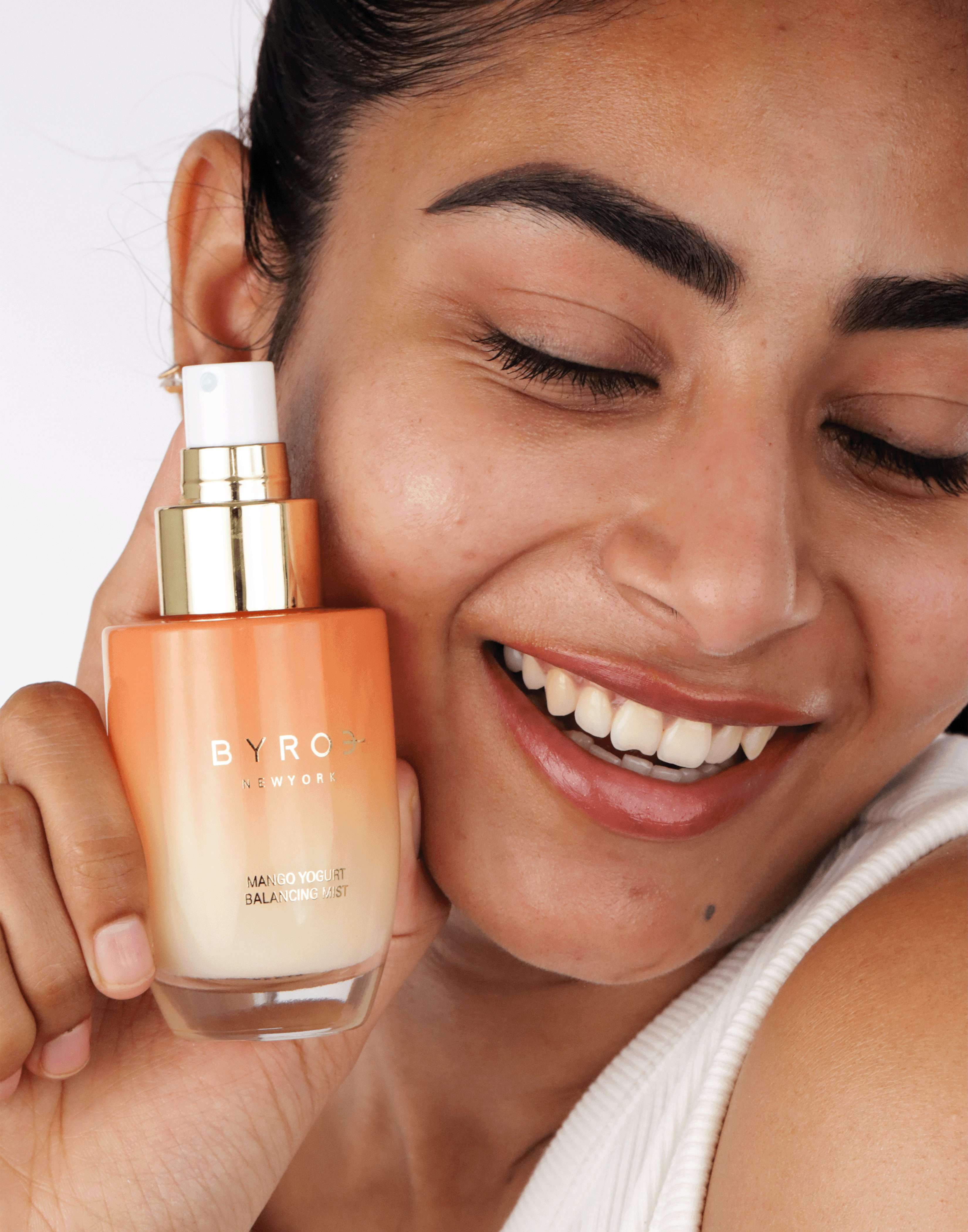 Model with Mango Yogurt Balancing Mist