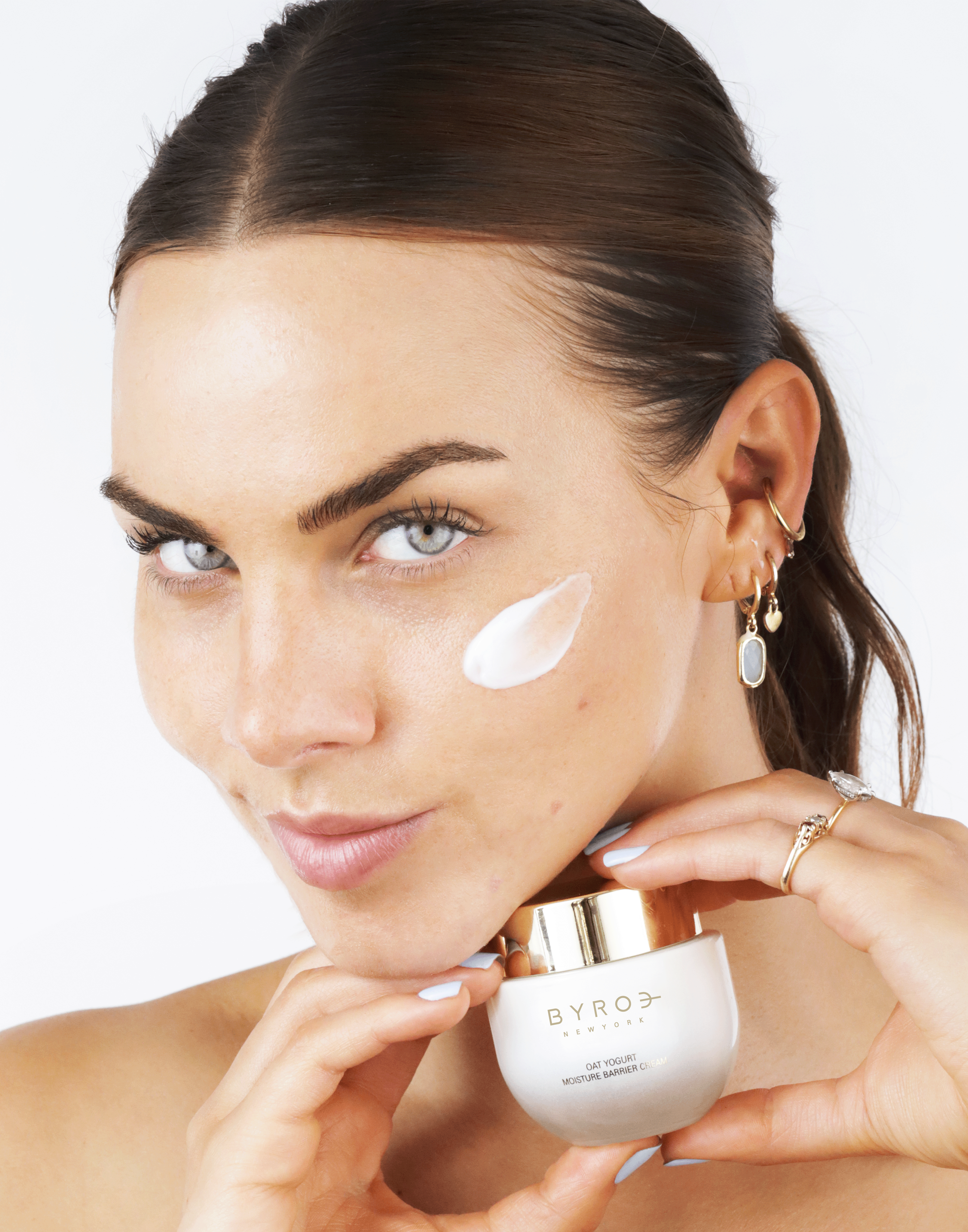 Model with Oat Yogurt Moisture Barrier Cream