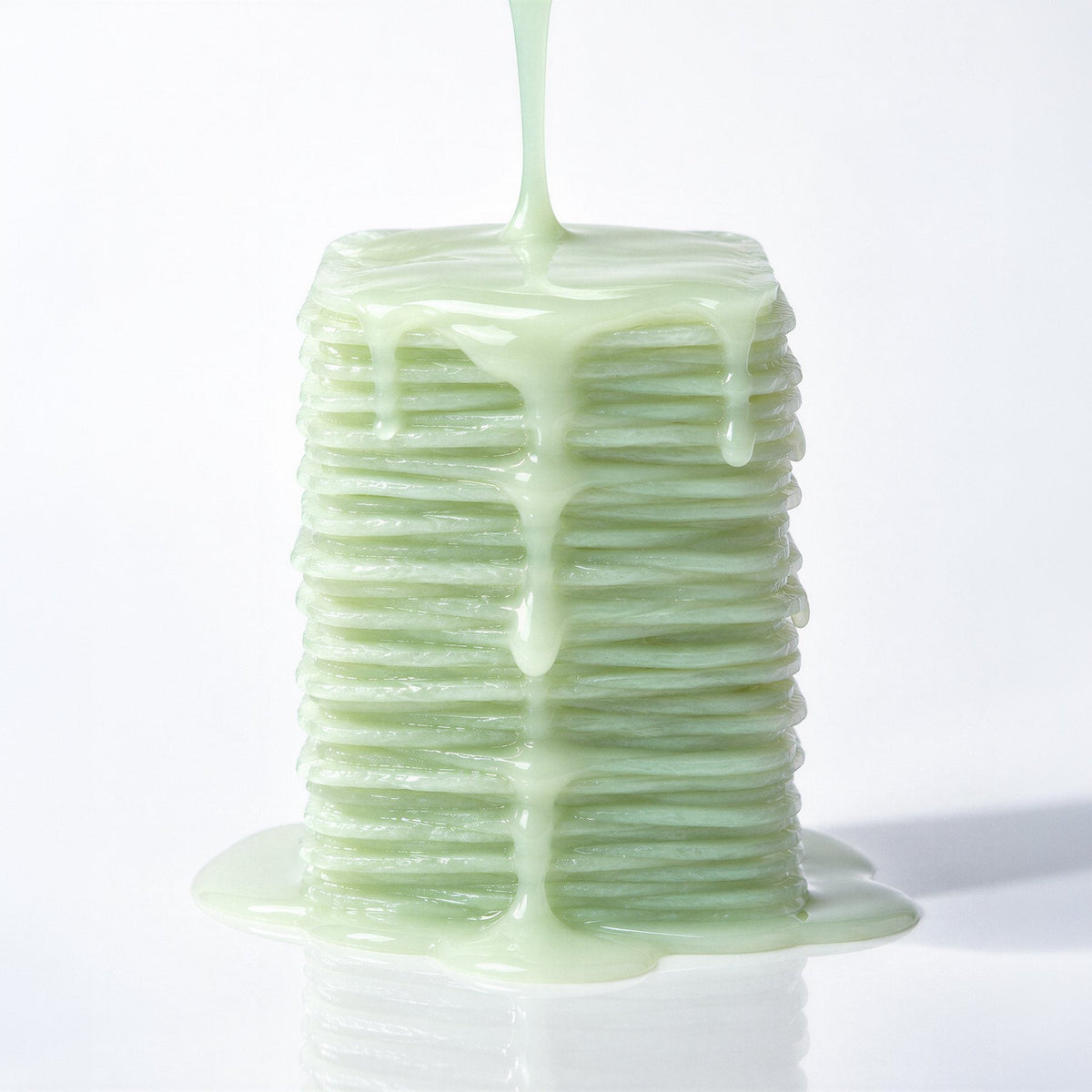 Stack of toner pads saturated with green essence